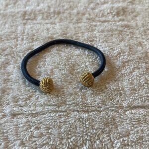 Elegant Black and Gold Bracelet by Source Unknown